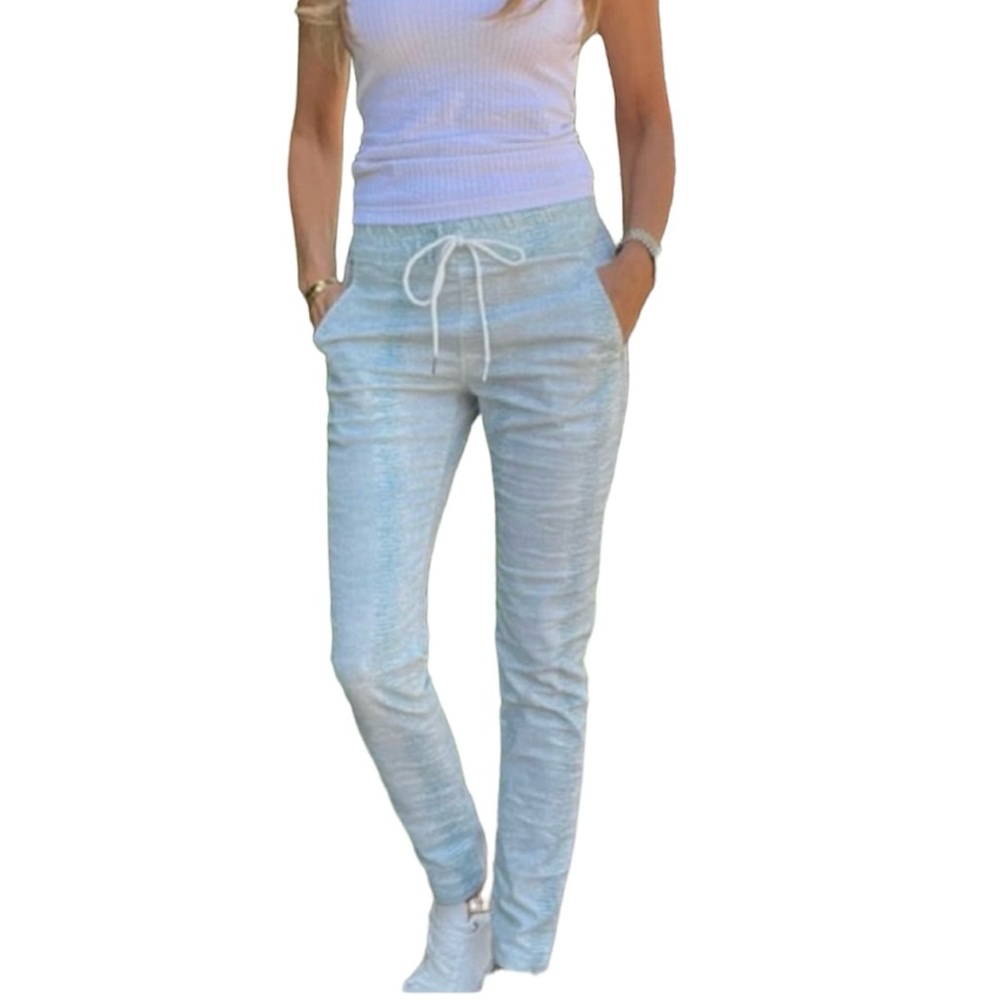 Nike women’s size, small cream and blue joggers with drawstring & front pockets